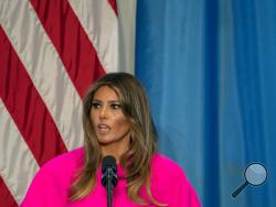 In this Sept. 20, 2017, file photo, first lady Melania Trump addresses a luncheon at the U.S. Mission to the United Nations in New York. Trump "hates" to see families separated at the border and hopes "both sides of the aisle" can reform the nation's immigration laws, according to a statement Sunday about the controversy over separation of immigrant parents and children at the U.S.-Mexico border. (AP Photo/Craig Ruttle, File)