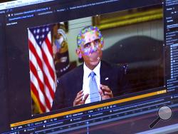 This image made from video of a fake video featuring former President Barack Obama shows elements of facial mapping used in new technology that lets anyone make videos of real people appearing to say things they've never said. There is rising concern that U.S. adversaries will use new technology to make authentic-looking videos to influence political campaigns or jeopardize national security. (AP Photo)