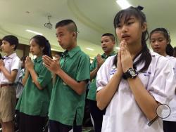 Students pray at Maesaiprasitsart school where six out of the rescued 12 boys study as they cheer the successful rescue in the Mae Sai district in Chiang Rai province, northern Thailand, Wednesday, July 11, 2018. A daring rescue mission in the treacherous confines of a flooded cave in northern Thailand has saved all 12 boys and their soccer coach who were trapped deep within the labyrinth, ending a grueling 18-day ordeal that claimed the life of an experienced volunteer diver and riveted people around the w