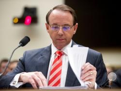 FILE - In this June 28, 2018, file photo, Deputy Attorney General Rod Rosenstein appears before a House Judiciary Committee hearing on Capitol Hill in Washington. A group of 11 House Republicans have introduced articles of impeachment against Rosenstein, who oversees special counsel Robert Mueller’s investigation into Russian election interference and President Donald Trump’s 2016 campaign. (AP Photo/Andrew Harnik, File)