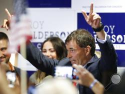 Troy Balderson, Republican candidate for Ohio's 12th Congressional District, speaks to a crowd of supporters during an election night party Tuesday, Aug. 7, 2018, in Newark, Ohio. (AP Photo/Jay LaPrete)