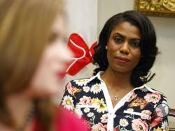 FILE - In this Feb. 14, 2017, file photo, Omarosa Manigault-Newman, then an aide to President Donald Trump, watches during a meeting with parents and teachers in the Roosevelt Room of the White House in Washington. The White House is slamming a new book by ex-staffer Omarosa Manigault-Newman, calling her “a disgruntled former White House employee.” (AP Photo/Evan Vucci, File)