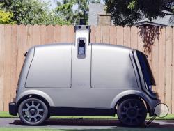 This undated image provided by The Kroger Co. shows an autonomous vehicle called the R1. Kroger will begin testing grocery deliveries using driverless cars outside of Phoenix. The grocery chain said the project will begin Thursday, Aug. 16, 2018, in Scottsdale, at a Fry's supermarket, which is owned by Kroger. The Toyota Prius will be used for the deliveries, manned by a human to monitor its performance. During phase two in the fall deliveries will be made by the R1 with no human aboard. (The Kroger Co. via