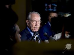 Senate Judiciary Committee Chairman Chuck Grassley, R-Iowa, speaks to reporters on Capitol Hill, Wednesday, Sept. 19, 2018, in Washington. Christine Blasey Ford wants the FBI to investigate her allegation that she was sexually assaulted by Supreme Court nominee Brett Kavanaugh before she testifies at a Senate Judiciary Committee hearing next week. (AP Photo/Andrew Harnik)
