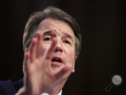 FILE - In this Sept. 5, 2018, file photo, Supreme Court nominee Brett Kavanaugh, testifies before the Senate Judiciary Committee on Capitol Hill in Washington, for the second day of his confirmation hearing to replace retired Justice Anthony Kennedy. (AP Photo/Manuel Balce Ceneta, File)