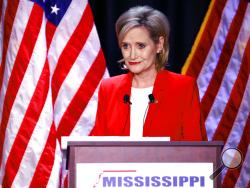 Appointed U.S. Sen. Cindy Hyde-Smith, R-Miss., answers a question during a televised Mississippi U.S. Senate debate with Democrat Mike Espy in Jackson, Miss., Tuesday, Nov. 20, 2018. (AP Photo/Rogelio V. Solis, Pool)