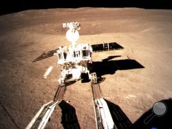 In this photo provided on Thursday, Jan. 3, 2019, by China National Space Administration via Xinhua News Agency, Yutu-2, China's lunar rover, leaves wheel marks after leaving the lander that touched down on the surface of the far side of the moon. A Chinese spacecraft on Thursday, Jan. 3, made the first-ever landing on the far side of the moon, state media said. The lunar explorer Chang'e 4 touched down at 10:26 a.m., China Central Television said in a brief announcement at the top of its noon news broadcas
