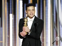 This image released by NBC shows Rami Malek accepting the award for best actor in a motion picture drama for his role as Freddie Mercury in a scene from "Bohemian Rhapsody" during the 76th Annual Golden Globe Awards at the Beverly Hilton Hotel on Sunday, Jan. 6, 2019, in Beverly Hills, Calif. (Paul Drinkwater/NBC via AP)