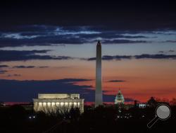 The Washington skyline is seen on day 19 of a partial government shutdown on the morning after President Donald Trump used a prime-time TV address from the Oval Office to urge congressional Democrats to relent on their opposition to his proposed U.S.-Mexico border wall, Wednesday, Jan. 9, 2019. From left are the Lincoln Memorial, the Washingtonton Monument, and the U.S. Capitol. (AP Photo/J. Scott Applewhite)