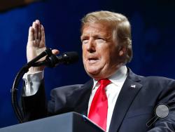 President Donald Trump speaks at the American Farm Bureau Federation's 100th Annual Convention, Monday Jan. 14, 2019, in New Orleans. (AP Photo/Jacquelyn Martin)