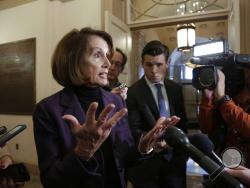 Speaker of the House Nancy Pelosi, D-Calif., takes questions from reporters, Friday, Jan. 18, 2019, on Capitol Hill in Washington. (AP Photo/J. Scott Applewhite)