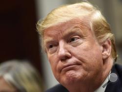 President Donald Trump listens during a meeting with Hispanic pastors in the Roosevelt Room of the White House in Washington, Friday, Jan. 25, 2019. (AP Photo/Susan Walsh)