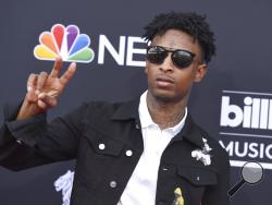 FILE - In this Sunday, May 20, 2018, file photo, 21 Savage arrives at the Billboard Music Awards at the MGM Grand Garden Arena in Las Vegas. It was a shock for fans when 21 Savage was taken into custody Sunday, Feb. 3, 2019, by U.S. immigration agents in Georgia. It was an even bigger shock to learn he had been an immigrant in the first place. (Photo by Jordan Strauss/Invision/AP, File)