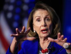 In this March 8, 2019, photo, House Speaker Nancy Pelosi of Calif., speaks at the Economic Club of Washington in Washington. Pelosi is setting a high bar for impeachment of President Donald Trump, saying he is "just not worth it" even as some on her left flank clamor to start proceedings (AP Photo/Manuel Balce Ceneta)
