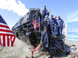 The crew from the Big Boy, No. 4014 pose for a photograph during the commemoration of the 150th anniversary of the Transcontinental Railroad completion at Union Station Thursday, May 9, 2019, in Ogden, Utah. (AP Photo/Rick Bowmer)
