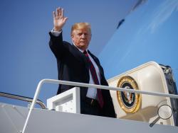 President Donald Trump waves as he boards Air Force One for a trip to New York to attend a fundraiser, Thursday, May 16, 2019, at Andrews Air Force Base, Md. (AP Photo/Evan Vucci)