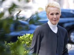 E. Jean Carroll is photographed, Sunday, June 23, 2019, in New York. Carroll, a New York-based advice columnist, claims Donald Trump sexually assaulted her in a dressing room at a Manhattan department store in the mid-1990s. Trump denies knowing Carroll. (AP Photo/Craig Ruttle)