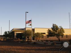 FILE - This June 20, 2019, file frame from video shows the entrance of a Border Patrol station in Clint, Texas. U.S. Customs and Border Protection has told a Texas congresswoman Monday, June 24, that the agency is quickly removing children from the patrol station following reports that children locked inside were in a perilous situation. (AP Photo/Cedar Attanasio, File)