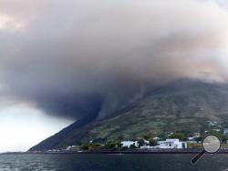 Ash rises into the sky a day after a volcano erupted on the small Sicilian island of Stromboli, southern Italy, early Thursday, 4 July 2019. Civil protection authorities said a hiker was killed during the eruptions on Wednesday which sent about 30 tourists jumping into the sea for safety. (Bartolino Leone/ANSA via AP)