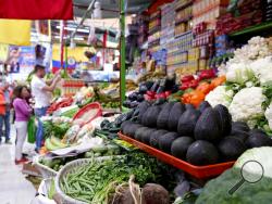 Mexico Avocados Image ID : 19193698100446 Avocados are displayed for sale at the Medellin market in Mexico City, Friday, July 12, 2019. Mexicans are dismayed by continued increases in the price for avocados, a staple of the country's cuisine. The government says an increased demand in the United States and a slight drop in production are to blame. (AP Photo/Cristina Baussan)