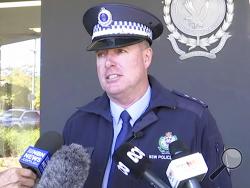 In this image made from video, New South Wales state police Acting Inspector Darren Williams speaks about child drivers during a news conference in Coffs Harbour, Australia, Monday, July 15, 2019. Four children aged 10 to 14 packed fishing rods in a parent's SUV, left a farewell note then drove more than 1,000 kilometers (600 miles) down the Australian east coast before they were stopped by police the next day, an officer said on Monday. (Australian Broadcasting Corporation via AP)