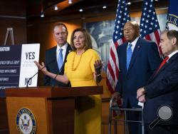 From left, House Intelligence Committee Chairman Adam Schiff, D-Calif., Speaker of the House Nancy Pelosi, D-Calif., House Oversight and Reform Committee Chairman Elijah Cummings, D-Md., and House Judiciary Committee Chair Jerrold Nadler, D-N.Y., hold a news conference after the back-to-back hearings with former special counsel Robert Mueller who testified about his investigation into Russian interference in the 2016 election, on Capitol Hill in Washington, Wednesday, July 24, 2019. (AP Photo/J. Scott Apple