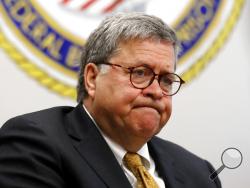 FILE - In this July 8, 2019 file photo, Attorney General William Barr speaks during a tour of a federal prison in Edgefield, S.C. The Justice Department says it will carry out executions of federal death row inmates for the first time since 2003. The announcement Thursday says five inmates will be executed starting in December. (AP Photo/John Bazemore)