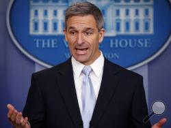 Acting Director of United States Citizenship and Immigration Services Ken Cuccinelli, speaks during a briefing at the White House, Monday, Aug. 12, 2019, in Washington. (AP Photo/Evan Vucci)