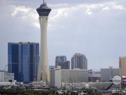 FILE - This Tuesday, Aug. 29, 2017, file photo shows the Las Vegas skyline. Las Vegas is set to bid on nearly a half dozen different NCAA college championship events, including women’s basketball. The NCAA will start accepting bids Monday, Aug. 26, 2019, on nearly two dozen sports championships over all three divisions. (AP Photo/John Locher, File)