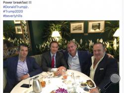 This Facebook screen shot provided by The Campaign Legal Center shows, from left, Donald Trump Jr., Tommy Hicks Jr., Lev Parnas and Igor Fruman, posted on May 21, 2018. Parnas and Fruman were arrested on Thursday, Oct. 10, 2019, on campaign finance violations resulting from a donation to a political action committee supporting President Donald Trump's reelection. (The Campaign Legal Center via AP)