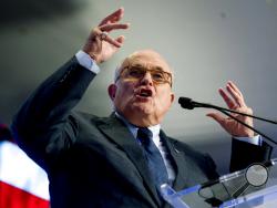 FILE - In this May 5, 2018, file photo, Rudy Giuliani, an attorney for President Donald Trump, speaks in Washington. Giuliani says he'd only cooperate with the House impeachment inquiry if his client agreed. Central to the investigation is the effort by Giuliani to have Ukraine conduct a corruption probe into Joe Biden and his son's dealings with a Ukrainian energy company. Trump echoed that request in a July 2019 call with Ukraine's president. The House Intelligence Committee is leading the inquiry, and Ch