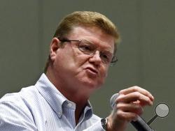 FILE - In this April 17, 2017, file photo, Nevada Republican U.S. Rep. Mark Amodei answers a question during a town hall at the Reno Sparks Convention Center in Reno, Nev. Amodei is facing Republican backlash after being asked what he thought of the Democrats’ impeachment probe into President Donald Trump, and replying, “Let‘s put it through the process and see what happens.” (Andy Barron/Reno Gazette Journal via AP, File)