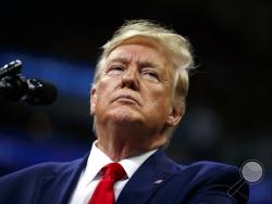 President Donald Trump speaks at a campaign rally at the Target Center, Thursday, Oct. 10, 2019, in Minneapolis. (AP Photo/Evan Vucci)