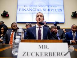 In this Oct. 23, 2019 photo, Facebook CEO Mark Zuckerberg arrives for a House Financial Services Committee hearing on Capitol Hill in Washington. Zuckerberg’s social network in Washington is shrinking. Bipartisan hostility against Facebook has been building for months, fueled by a series of privacy scandals, the site’s use by Russian operatives in the 2016 presidential campaign and accusations that Facebook crushes competitors. Now, with the 2020 elections approaching, Democrats especially are homing in on 