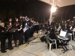 In this Tuesday, Dec. 10, 2019 photo, a theater troupe performs Les Miserables in at an outdoor event space in Hong Kong. A Hong Kong theater troupe is making audiences weep by touring a stirring production of 'Les Miserables.' Based on Victor Hugo's tale of rebellion in 19th-century France, the rousing music and lyrics of struggle and resistance struck chords with audience members emotionally and physically drained after six months of protests that have convulsed the city. (AP Photo/John Leicester)