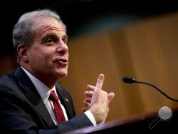 Department of Justice Inspector General Michael Horowitz testifies at a Senate Judiciary Committee hearing on the Inspector General's report on alleged abuses of the Foreign Intelligence Surveillance Act, Wednesday, Dec. 11, 2019, on Capitol Hill in Washington. (AP Photo/Andrew Harnik)