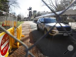 Fencing and magnetometers are set up around Capitol Square for the anticipated pro-gun rally Sunday, Jan. 19, 2020, in Richmond, Va. (AP Photo/Steve Helber)