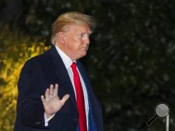 President Donald Trump waves as he leaves the White House, Monday, Jan. 20, 2020, in Washington to attend the annual economic forum in Davos, Switzerland. (AP Photo/Manuel Balce Ceneta)