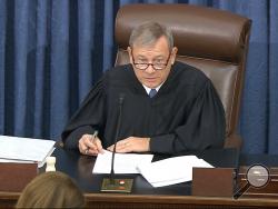 In this image from video, presiding officer Supreme Court Chief Justice John Roberts speaks during the impeachment trial against President Donald Trump in the Senate at the U.S. Capitol in Washington, Tuesday, Jan. 21, 2020. (Senate Television via AP)