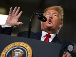 FILE- In this Jan. 28, 2020, file photo, President Donald Trump speaks during a campaign rally at the Wildwoods Convention Center Oceanfront in Wildwood, N.J. Trump will be facing his accusers Tuesday night during his State of the Union speech. The impeached president is speaking on the eve of what's anticipated to be his Senate acquittal on Wednesday. (AP Photo/ Evan Vucci, File)