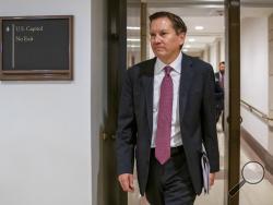 FILE - In this Oct. 4, 2019, file photo, Michael Atkinson, the inspector general of the intelligence community, arrives at the Capitol in Washington for closed-door questioning about a whistleblower complaint that triggered President Donald Trump's impeachment. Trump has fired Atkinson. Trump informed the Senate intelligence committee Friday, April 3, 2020, of his decision to fire Atkinson, according to a letter obtained by The Associated Press. (AP Photo/J. Scott Applewhite, File)