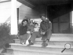 In this image provided by the McConnell Center at the University of Louisville, Mitch McConnell sits with his parents, Julia "Dean" and A.M. McConnell in this image from the mid 1940's in Five Points, Ala. As the coronavirus pandemic unfolds, Senate Majority Leader Mitch McConnell flashes back to an earlier crisis that gripped the nation, and his own life, when he was a boy. He was struck with polio. (McConnell Center at the University of Louisville via AP)