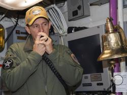 In this image provided by the U.S. Navy, Capt. Brett Crozier, then-commanding officer of the aircraft carrier USS Theodore Roosevelt (CVN 71), addresses the crew on Jan. 17, 2020, in San Diego, Calif. The Navy’s top admiral will soon decide the fate of the ship captain who was fired after pleading for his superiors to move faster to safeguard his coronavirus-infected crew on the USS Theodore Roosevelt. (Mass Communication Specialist Seaman Alexander Williams/U.S. Navy via AP)