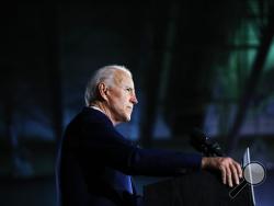 FILE - In this Feb. 29, 2020, file photo Democratic presidential candidate former Vice President Joe Biden speaks at a primary night election rally in Columbia, S.C. (AP Photo/Matt Rourke, File)