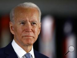 FILE - In this March 10, 2020, file photo Democratic presidential candidate former Vice President Joe Biden speaks to members of the press at the National Constitution Center in Philadelphia. (AP Photo/Matt Rourke, File)