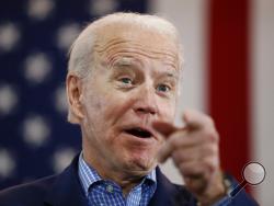FILE - In this Feb. 22, 2020, file photo, Democratic presidential candidate former Vice President Joe Biden speaks during a caucus night event in Las Vegas. As Biden’s search for a vice presidential running mate heats up, he is facing growing pressure to choose a black woman. (AP Photo/John Locher, File)