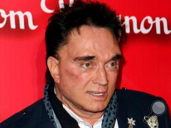 FILE - In this Feb. 18, 2012, file photo, Roy Horn, of Siegfried & Roy, arrives at the Keep Memory Alive 16th Annual "Power of Love Gala," honoring Muhammad Ali with his 70th birthday celebration in Las Vegas. Horn, one half of the longtime Las Vegas illusionist duo Siegfried & Roy, died of complications from the coronavirus, Friday, May 8, 2020. He was 75. (AP Photo/Jeff Bottari, File)