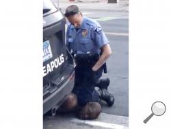 FILE - In this Monday, May 25, 2020, file frame from video provided by Darnella Frazier, a Minneapolis officer kneels on the neck of George Floyd, a handcuffed man who was pleading that he could not breathe, in Minneapolis. Police around the U.S. and law enforcement experts are broadly condemning the way Floyd, who died in police custody, was restrained by a Minneapolis officer who dug his knee into the man's neck. (Darnella Frazier via AP, File)