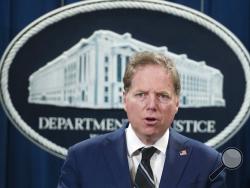 In this Oct. 26, 2018, file photo, Geoffrey Berman, U.S. attorney for the Southern District of New York, speaks during a news conference at the Department of Justice in Washington. 