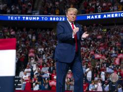 President Donald Trump arrives on stage to speak at a campaign rally at the BOK Center, Saturday, June 20, 2020, in Tulsa, Okla. (AP Photo/Evan Vucci)